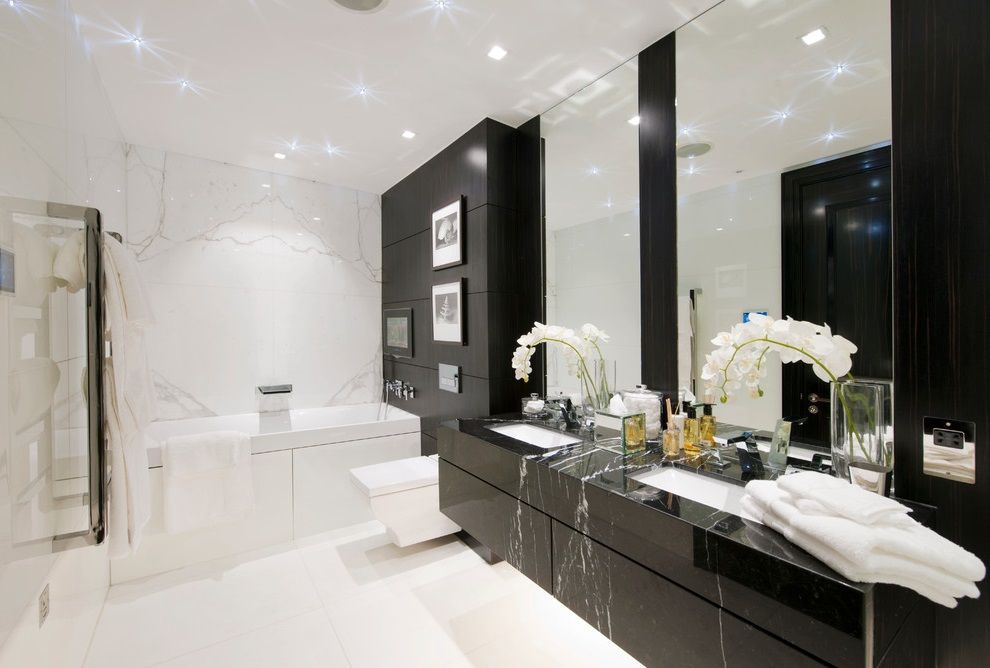 Modern Black and White Bathroom with Flat-Panel Cabinets