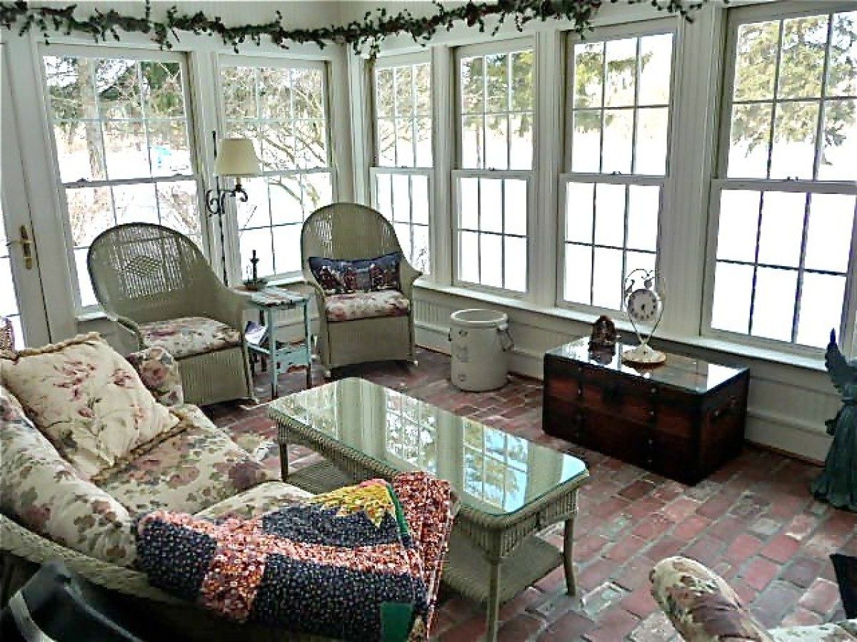 Nice Glass Table With White Wooden Sunroom Furniture Layout Idea Plus Floral Pillows Also Decorative Sconce (Photo 2465 of 7825)
