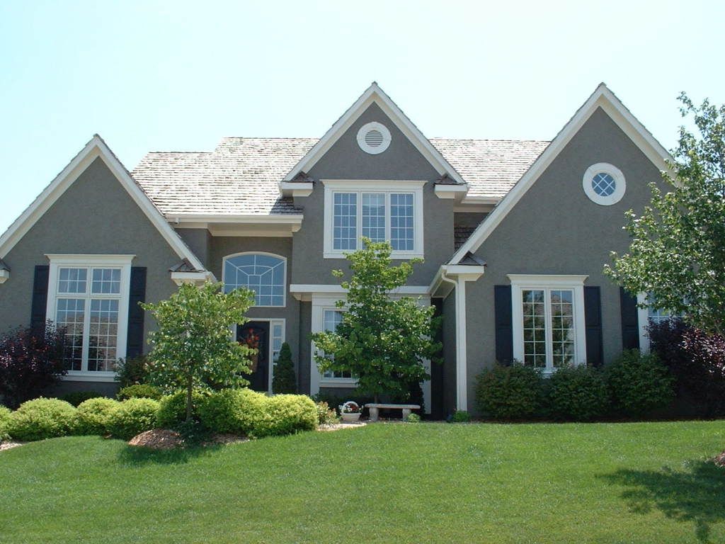 Noticeable Round Fixed Windows Mixed With Black Shutters And Trendy Grey Exterior Painting Ideas (Photo 2477 of 7825)
