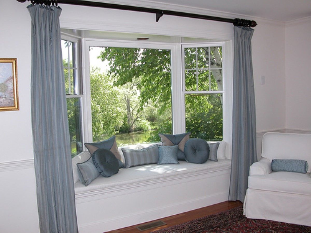 Various Gray Pillows Put On White Bay Window Seat Are Covered By Awesome Curtains Design (Photo 3138 of 7825)