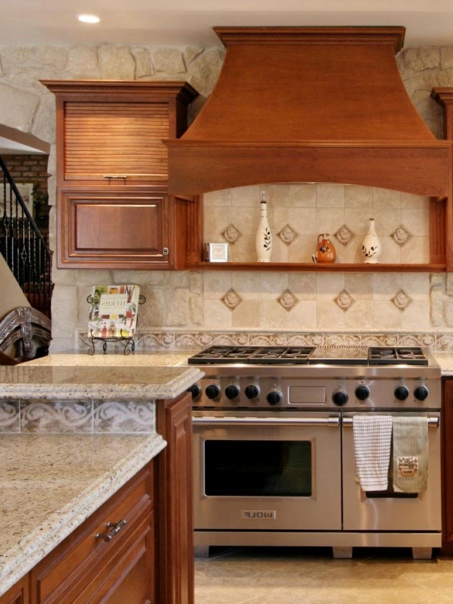 Vintage Wooden Kitchen Hood And Cabinets Over Brown Granite Countertop Plus Decorative Kitchen Tile Backsplash Design Idea (Photo 3158 of 7825)