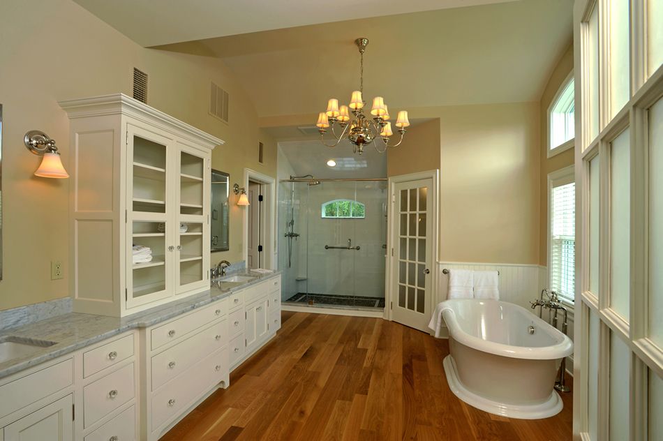 Yellow Chandelier Feats Charming Remodel Bathroom With Oval Freestanding Bathtub And Fabulous White Cabinet Unit (Photo 2656 of 7825)