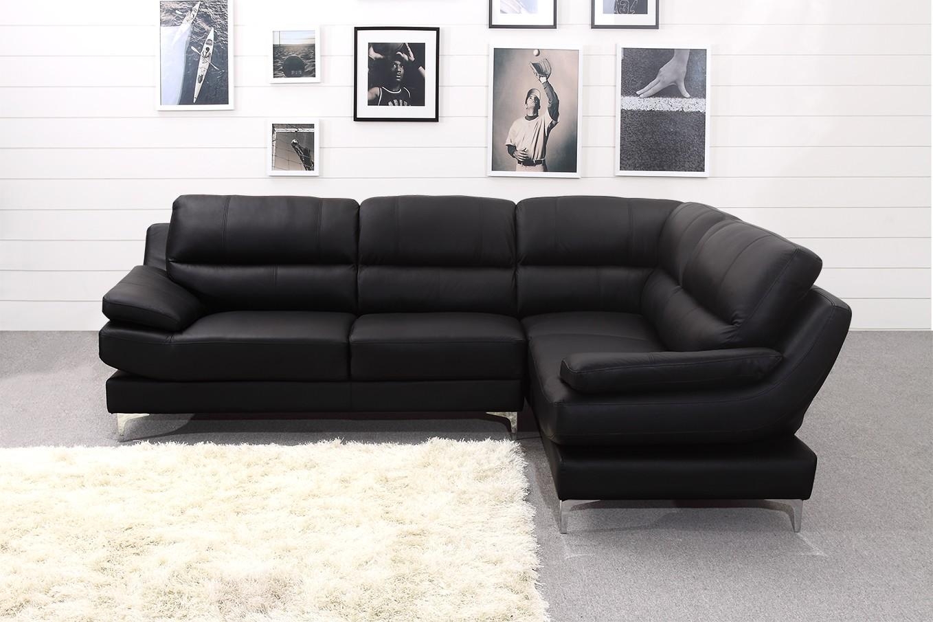 black leather corner sofa with white stitching