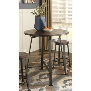 Ashley Challiman Round Counter Height Dining Table In Intended For Rustic Honey Dining Tables (View 12 of 15)