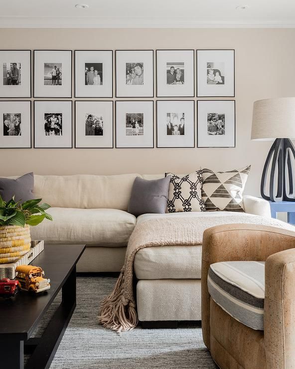 A Black And White Photo Gallery Is Mounted To A Cream Wall Above A Long  Cream Sofa With A Chai… | Cream Couch Living Room, Cream Sofa Living Room,  Family Room Walls Inside Cream Wall Art (View 6 of 15)