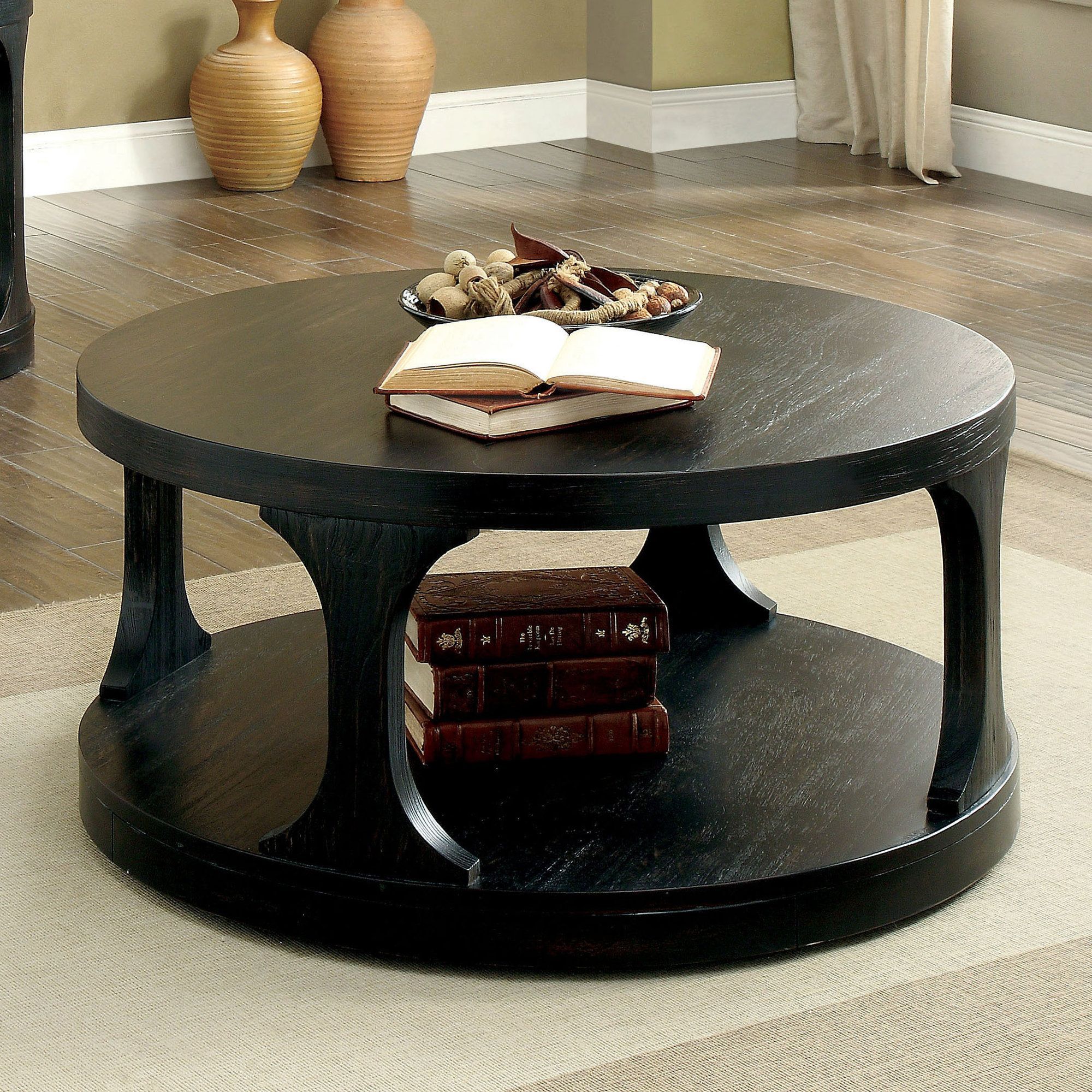 Bring A Touch Of Elegance To Your Home With A Black Circle Coffee Table Within Full Black Round Coffee Tables (Photo 11 of 15)