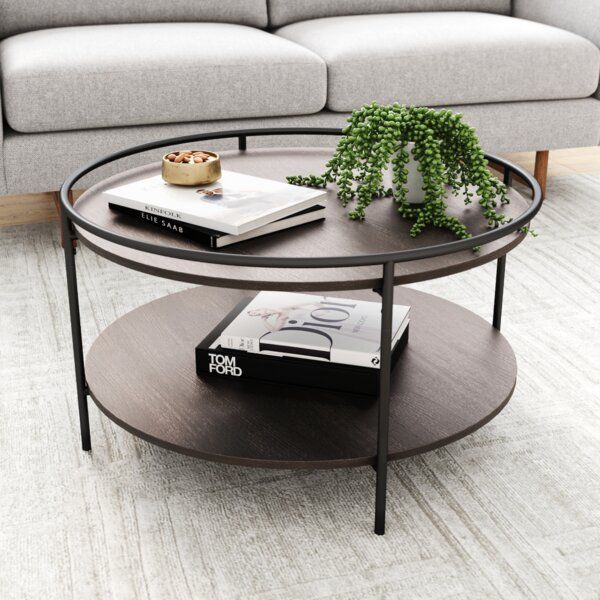 This 2 Tier Round Coffee Table Offers A Lot Of Style In A Compact Inside Wood Coffee Tables With 2 Tier Storage (View 13 of 15)