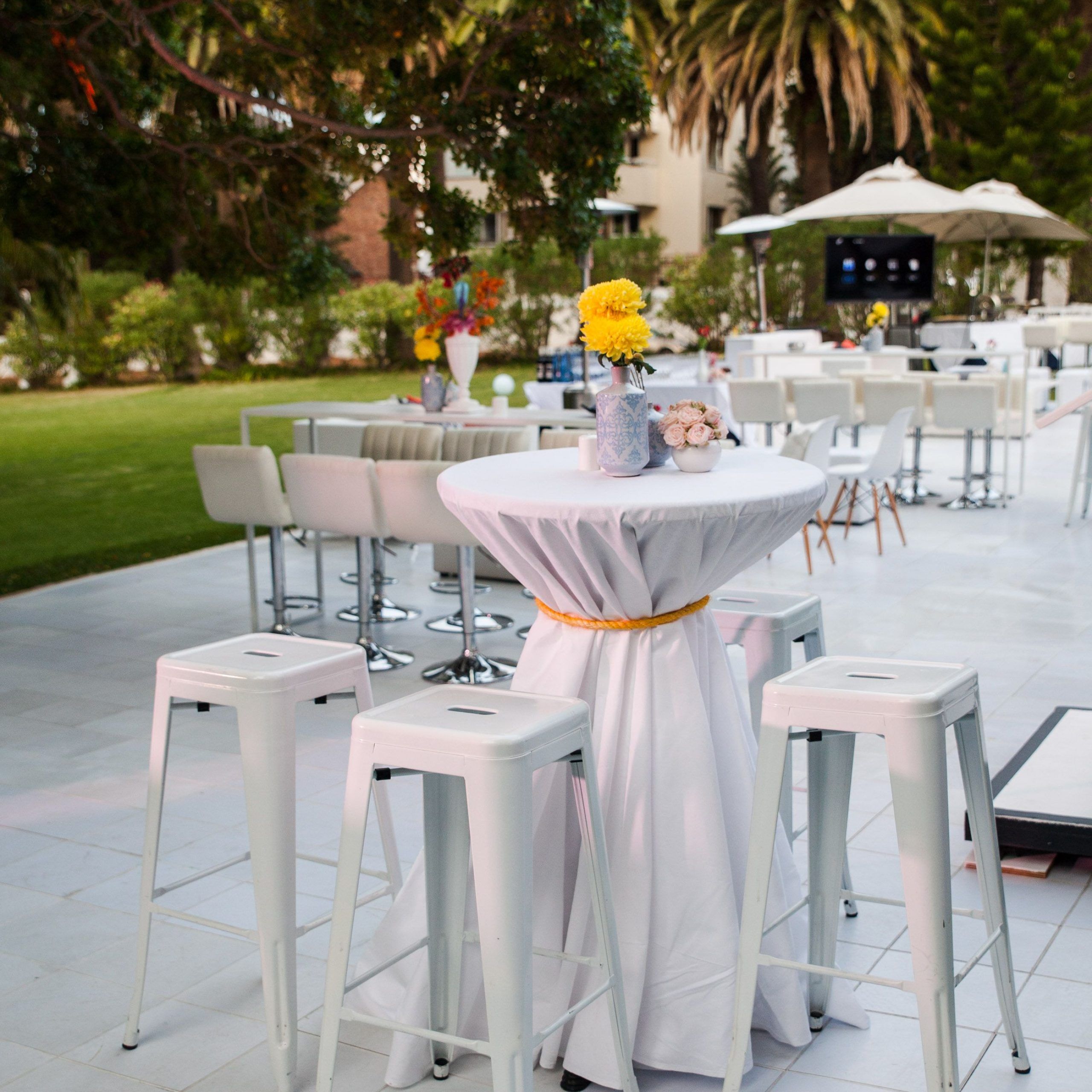 White Cocktail Furniture At An Outdoor Event For Pre Drinks Outdoor Regarding Natural Outdoor Cocktail Tables (View 7 of 15)