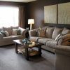 neutral-cream-living-room-sofa-under-decorative-rectangular-mirror-with-oval-glass-table-on-fur-rug (Photo 2441 of 7825)