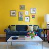 yellow-couch-also-floral-print-area-rug-idea-in-mid-century-living-room-plus-unique-table-lamp-and-brick-fireplace-mantel (Photo 2653 of 7825)