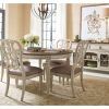 Caira Black 5 Piece Round Dining Sets With Upholstered Side Chairs (Photo 8 of 25)