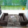 Faux Leather Sofas in Dark Brown (Photo 14 of 15)