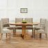 25 Collection of Circular Extending Dining Tables and Chairs