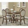 Caira Black 5 Piece Round Dining Sets With Upholstered Side Chairs (Photo 4 of 25)