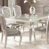 Caira Black 5 Piece Round Dining Sets With Upholstered Side Chairs (Photo 14 of 25)